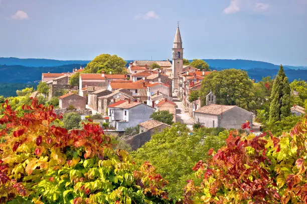 Idyllic hill town of Draguc in green landscape view, inland Istria, Croatia