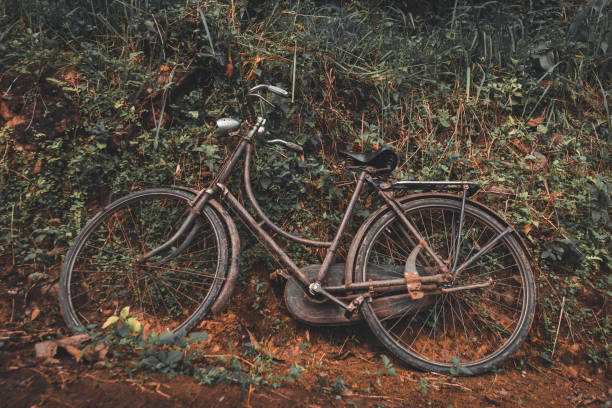 An Old Bicycle on The Edge of A Hill