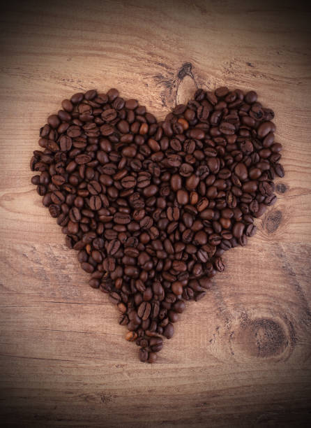 istock Heart-shaped coffee beans, Coffee love concept. 1305247105