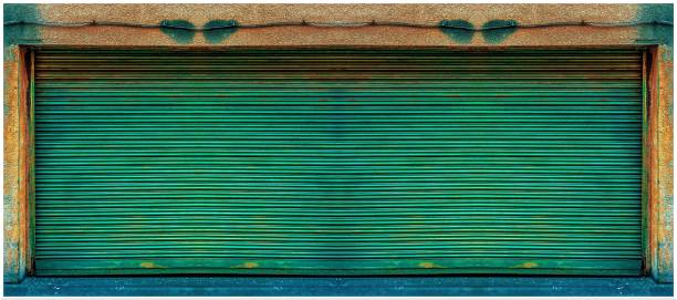 istock Closed steel shutter door of warehouse, storage or storefront for background and textured. 1305247970