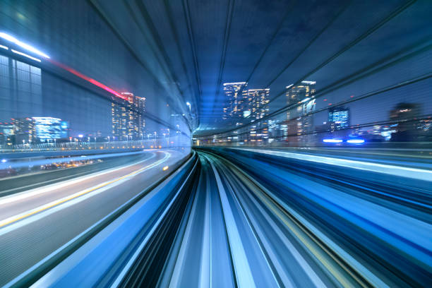 istock Motion blur of train moving inside tunnel in Tokyo, Japan 1305248813