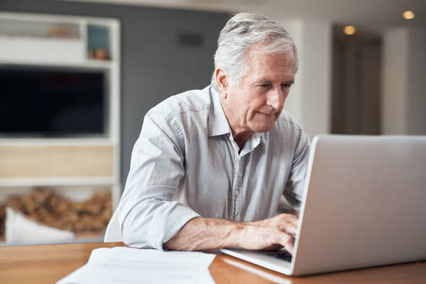 istock Updating my budget sheet on my laptop 1305249917