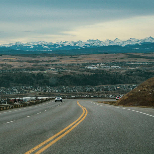 On-road view of Cochrane Picture taken on the road into Cochrane, Alberta, Canada. Taken in November 2019. cochrane alberta stock pictures, royalty-free photos & images