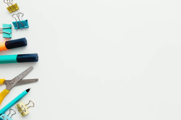 istock Clips, pencil, marker, scissors, white background. Work and education concept 1305253749