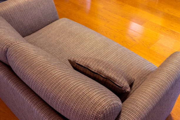 istock Sofa on the wood flooring 1305262556