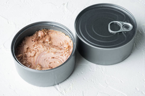 istock Canned italian tuna, in tin can, on white background 1305262847