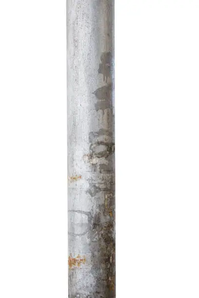 Photo of old metal pole isolated on white background