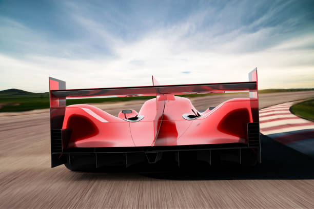 istock red sportscar driving on a race track 1305270697