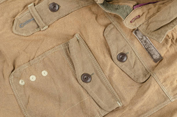 istock A crumpled brown shirt with a pocket and buttons. 1305273644