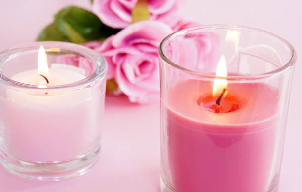 istock Aroma candles and pink roses. 1305273864