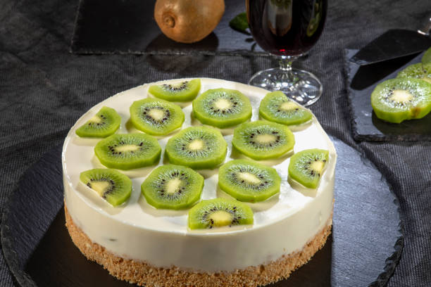 istock Decorated cheesecake with kiwi 1305276661