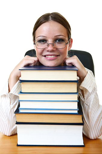 Young business girl with books