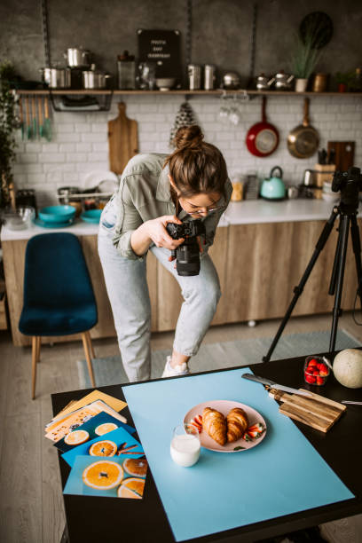 istock Taking a photo of croissant breakfast with professional camera 1305284777