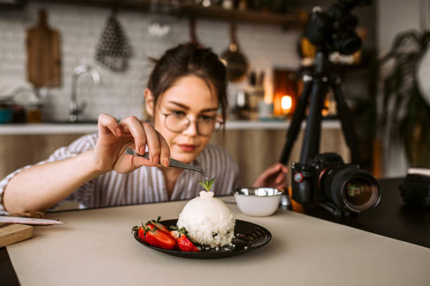 istock Woman decorating cake plate for taking a photo 1305284813
