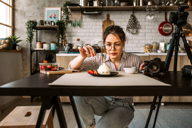 istock Woman decorating cake plate for taking a photo 1305284891