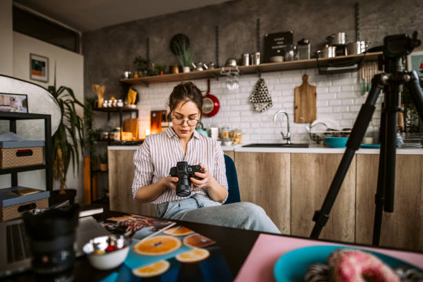 istock Photographer working at home photo studio 1305284899