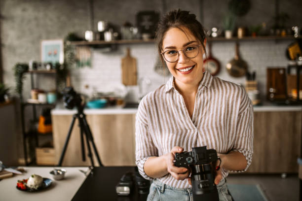 istock Photographer woman in her studio 1305284901