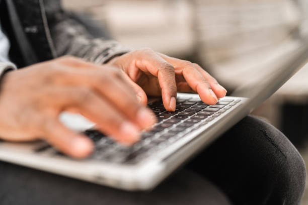istock University student typing on his laptop 1305291768