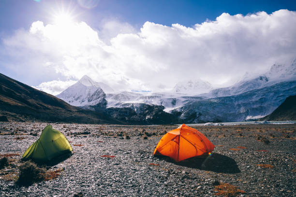 istock Camping facing beautiful glacier mountains in tibet,China 1305295343
