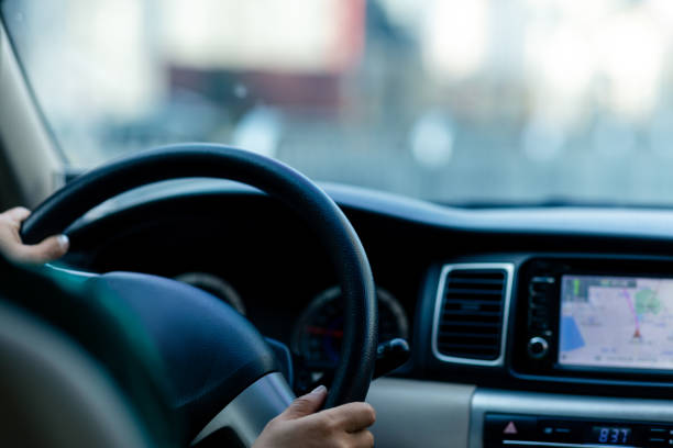 istock Driving a car in city 1305297009