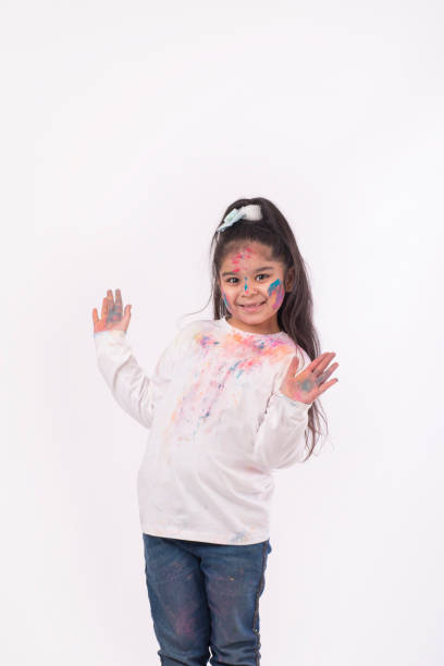 istock Indian kid stock photos Holi 1305299847