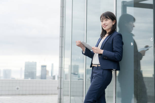 istock Japanese woman in suit 1305300403