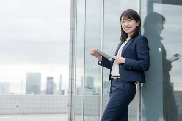 istock Japanese woman in suit 1305300441