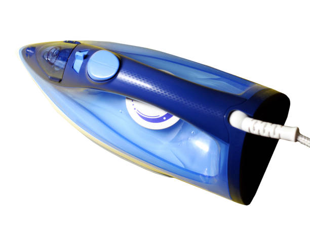 istock close up of Electric iron on white background 1305301564