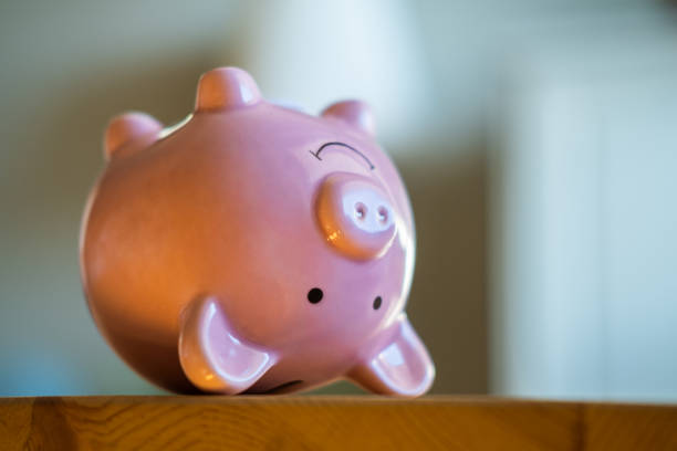 istock Piggy Bank upside down 1305301616