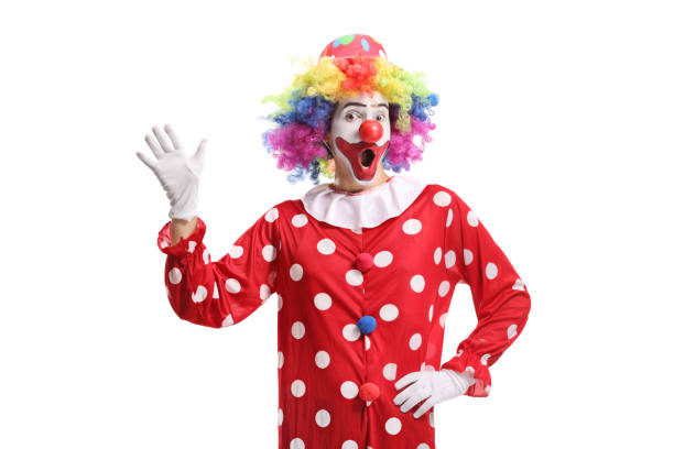 istock Funny cheerful clown waving 1305302180