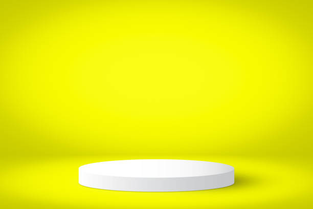 istock Empty white podium shelf or empty pedestal display on a yellow background. minimal style. Blank stand for showing product. 1305303581