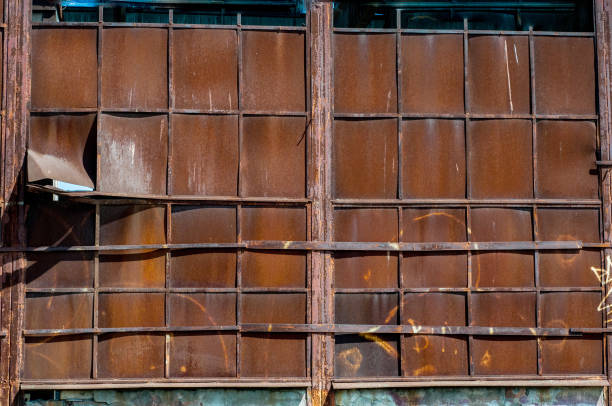 istock Background from old rusty metal sheets bonded to each other by argon welding 1305306973
