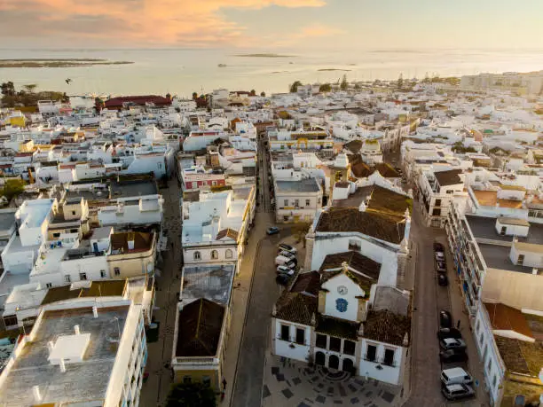 Photo of Aerial view of Olhao with a church in the foreground, Algarve, Portugal