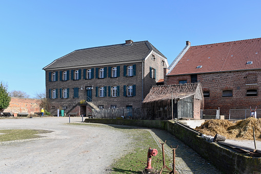 Monheim, February 24, 2021 - Haus Buergel is a medieval manor house located north of the Baumberg district of the town of Monheim am Rhein on the border with the Düsseldorf-Urdenbach district. Its origin is a Roman fort.