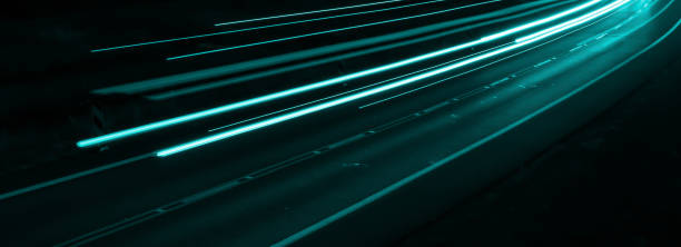istock blue car lights at night. long exposure 1305312244