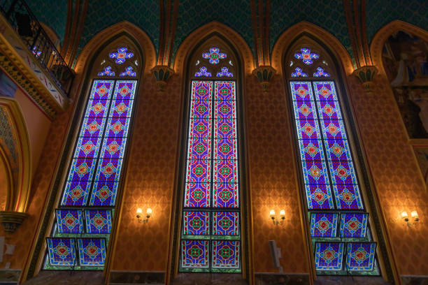 istock Colourful catholic church and stained glass 1305314118