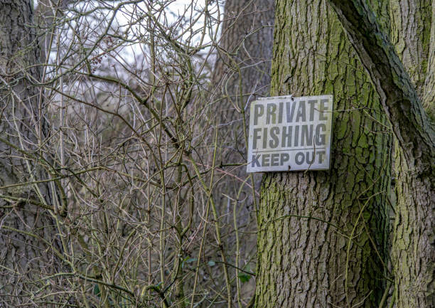 istock Private fishing keep out sign 1305315123