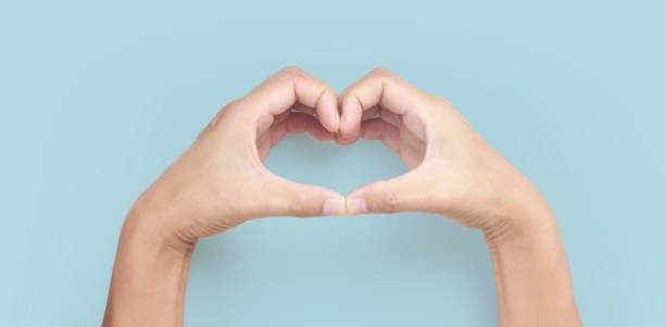 istock Hands making sign Heart isolated. Beautiful hands  with copy space 1305316230