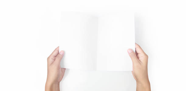 istock Hands holding paper blank for letter paper 1305316254
