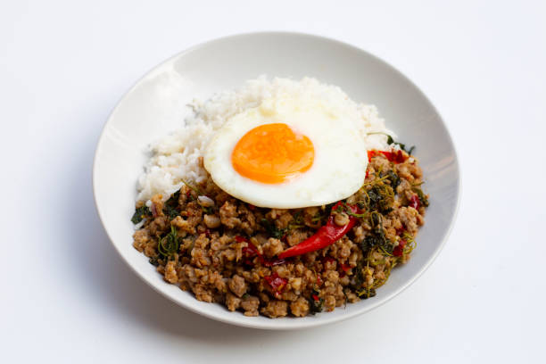 istock Rice topped with stir-fried pork with holy basil and fried egg 1305316384