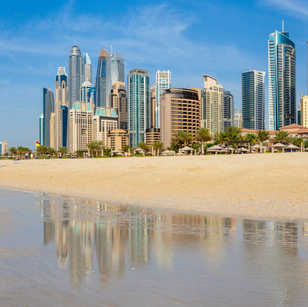 istock Dubai - The Marina towers from beach. 1305317581