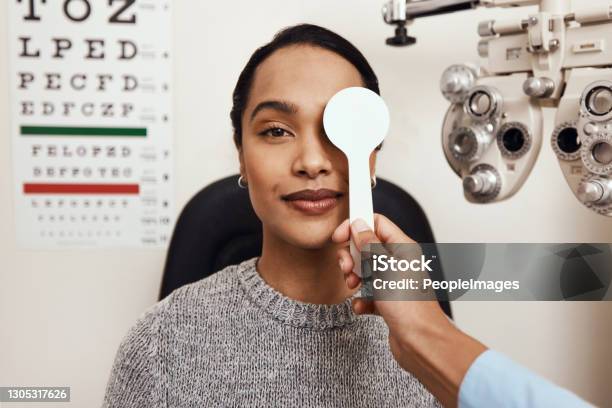 One Little Eye Test Goes A Long Way Stock Photo - Download Image Now - Eyesight, Optometry, Eye Exam