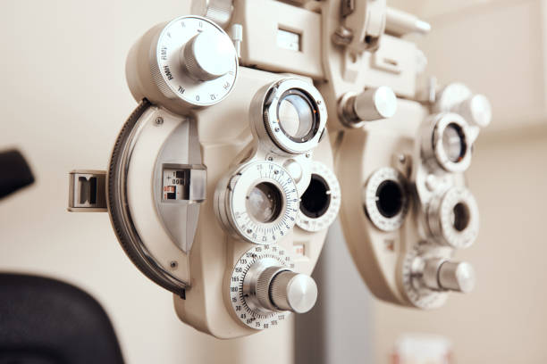 I can help you see more clearly Shot of an optical refractor in an optometrist’s office optometry stock pictures, royalty-free photos & images