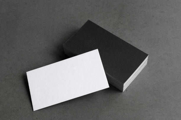 istock Business card on black background. 1305320661