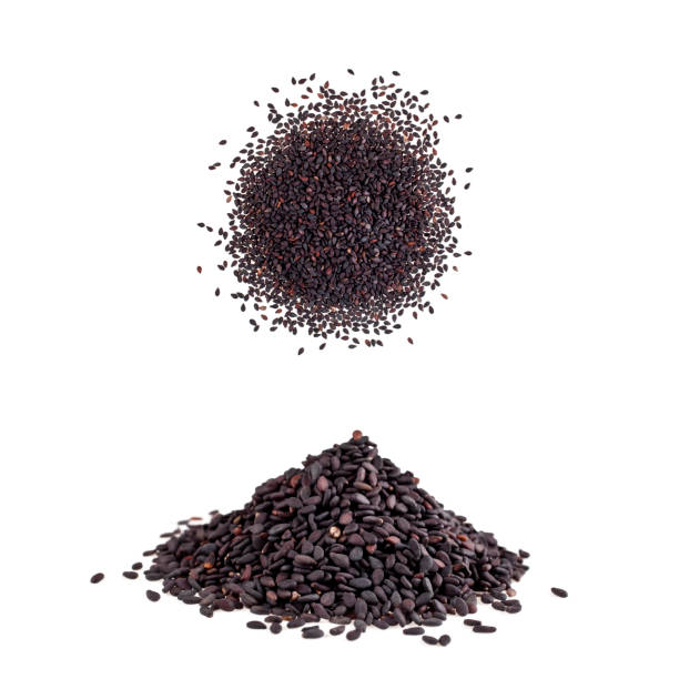 semillas de sésamo negro - sesame black stack cereal plant fotografías e imágenes de stock
