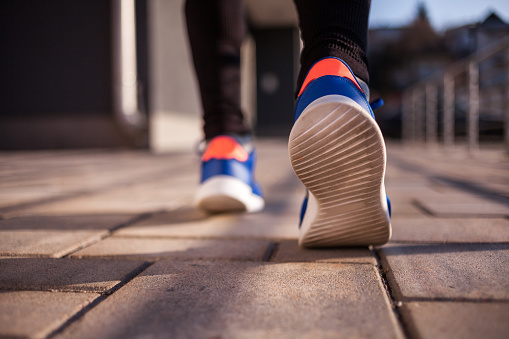 Close up shot of runner's shoes