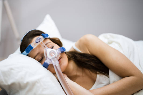 睡眠時無呼吸酸素マスク装置 - cpap ストックフォトと画像