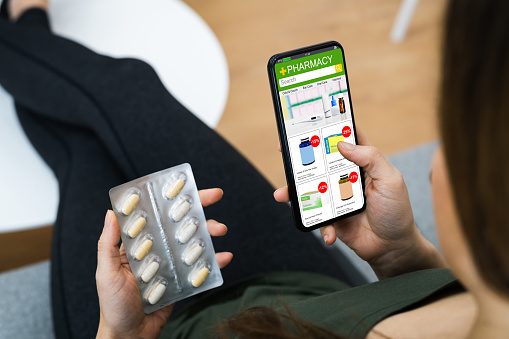 Buying Pills And Vitamins Online In Internet Shop On Mobile Phone
