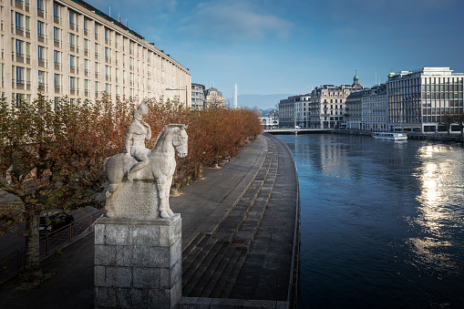 Geneva, Switzerland - December 05, 2019: Rhone River and Aigle de Geneve Statue - Statue by Frédéric Schmied - Geneva, Switzerland