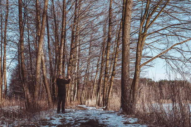 istock In winter, a man photographs nature 1305336082